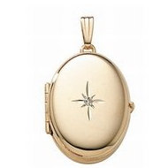 14K Yellow Gold Oval Four Photo Locket w/ 4 Pt. Diamond