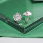 Fire badge earrings displayed on a green presentation box (PG102545, secondary photo 3)