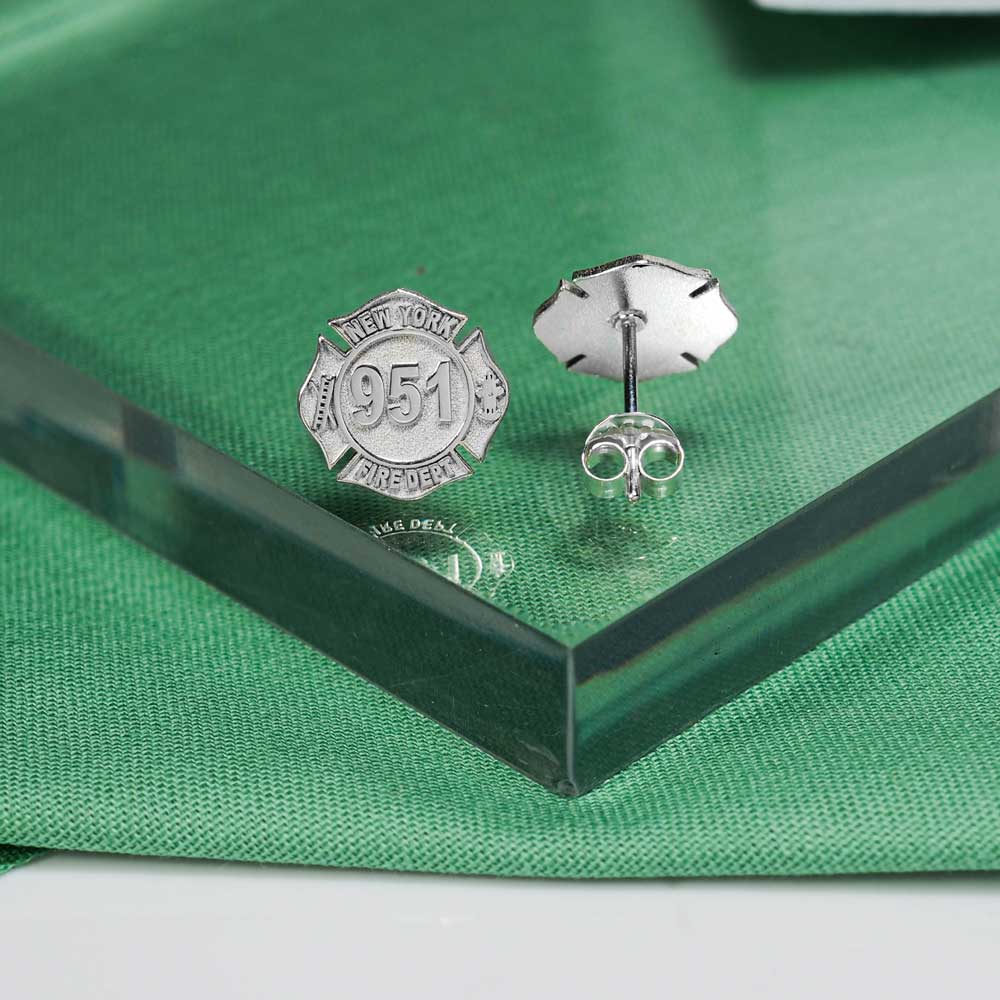 Fire badge earrings displayed on a green presentation box (PG102545, secondary photo 3)