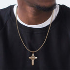 Firefighter badge cross pendant worn on a dark shirt (PG102877, secondary photo 3)