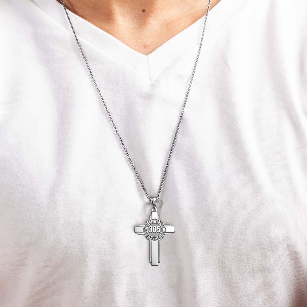 Firefighter badge cross pendant worn over a light shirt (PG102877, secondary photo 4)