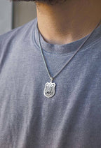 Personalized police badge — silver necklace on model