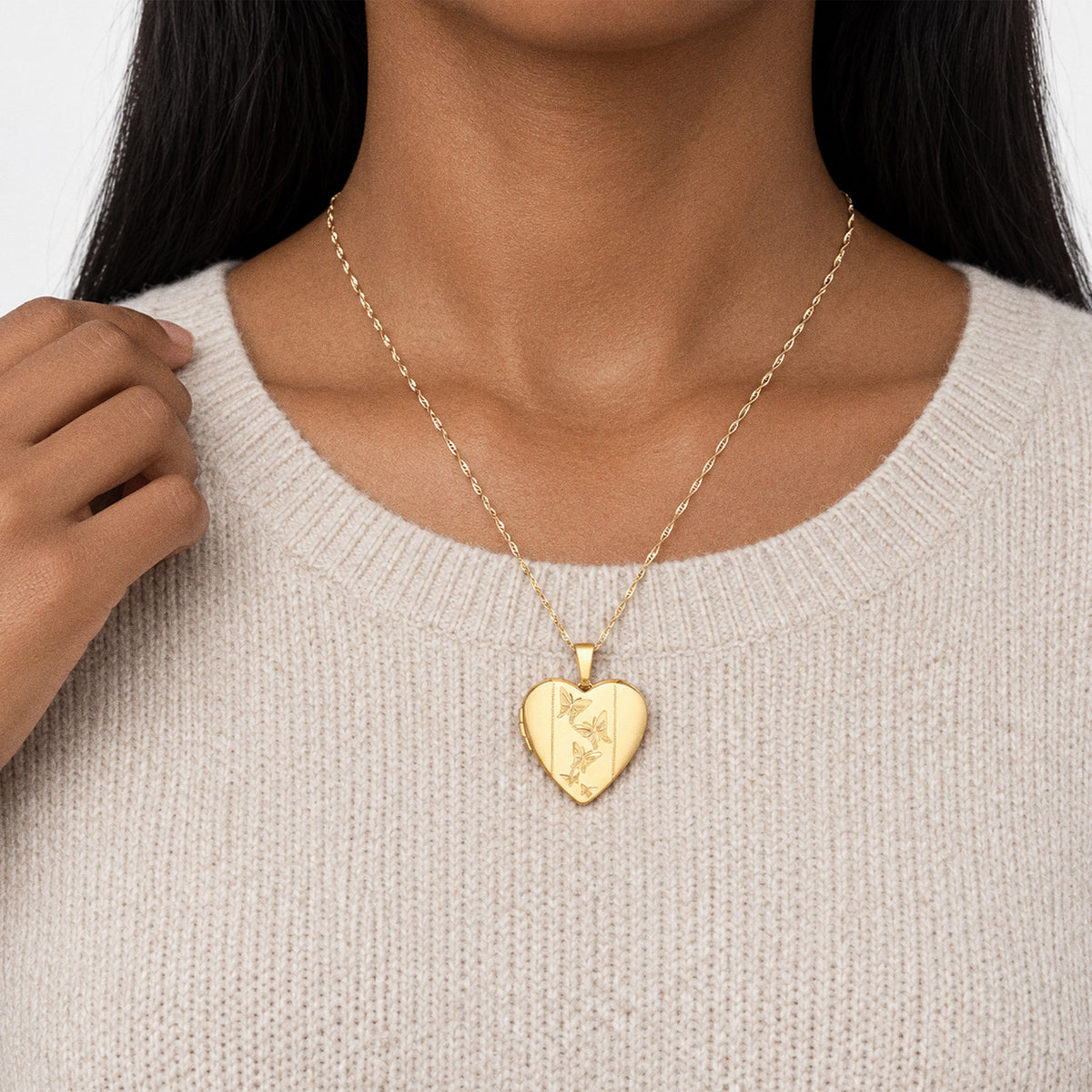 Solid 14K Yellow Gold Butterfly Heart Photo Locket - on model
