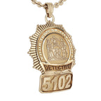 Angled view of a gold New York detective badge pendant with sample number 5102 (PG85780, secondary photo 2)