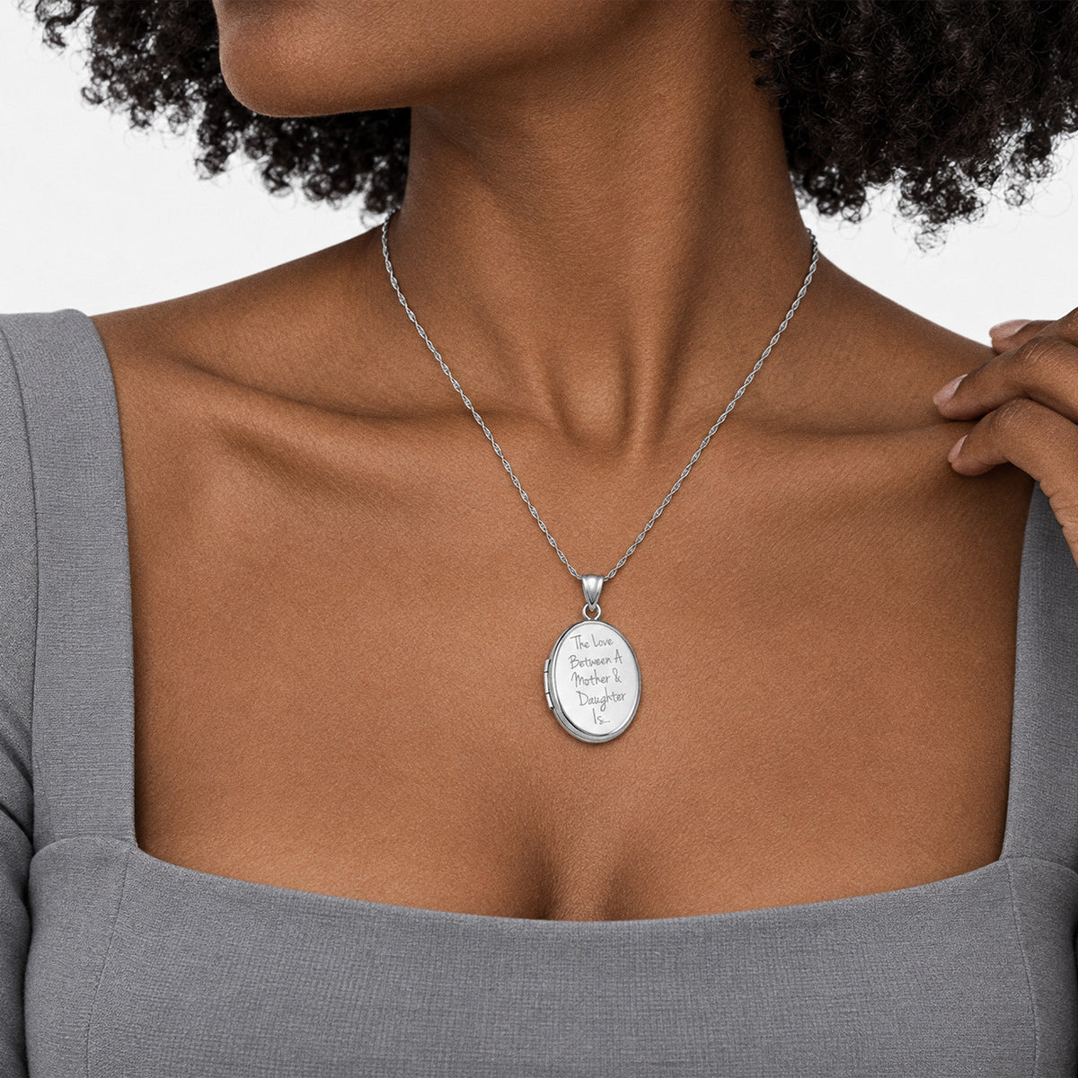 The Love Between A Mother & Daughter Is... Oval Photo Locket - on model