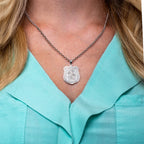 Saint Michael medal necklace worn against a teal top (PG88675, secondary photo 4)