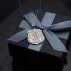 Saint Michael medal pendant displayed against dark fabric (PG88675, secondary photo 9)