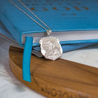 The Saint Michael police badge pendant displayed on a blue presentation box (PG88679, secondary photo 7)