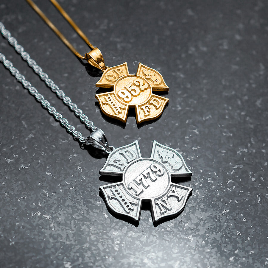 Silver and gold firefighter badge pendants on a dark surface (PG89011, secondary photo 2)