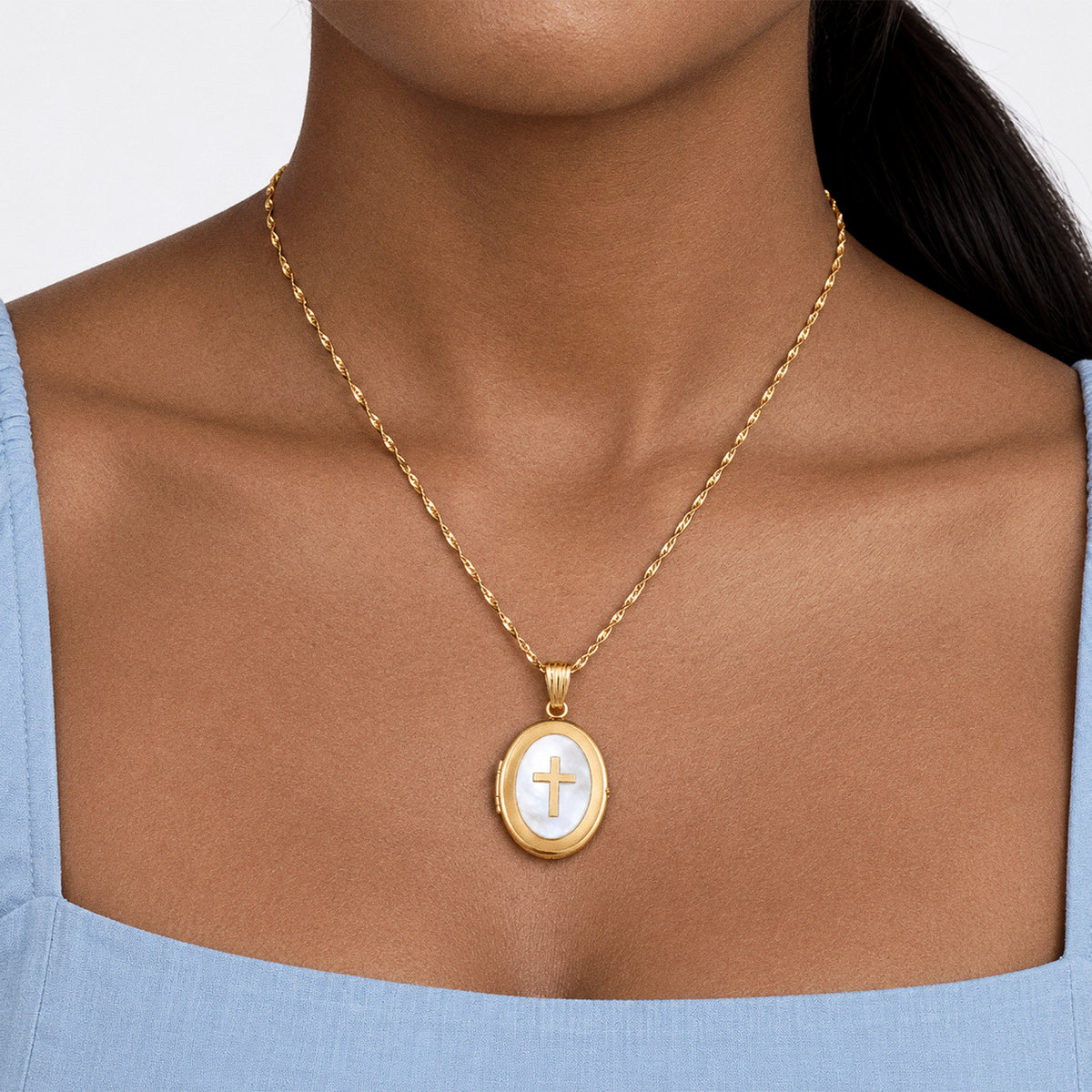 Solid 14K Yellow Gold Mother Of Pearl Cross Oval Photo Locket - on model