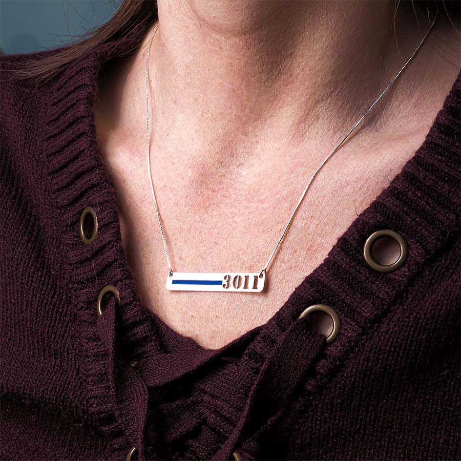 Thin-blue-line badge bar necklace displayed on a burgundy sweater (PG93919, secondary photo 5)