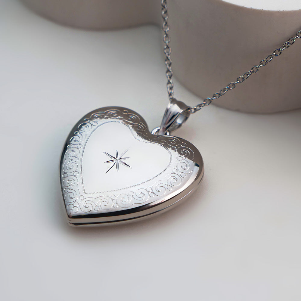Heart with Scroll Border and Star Design Locket